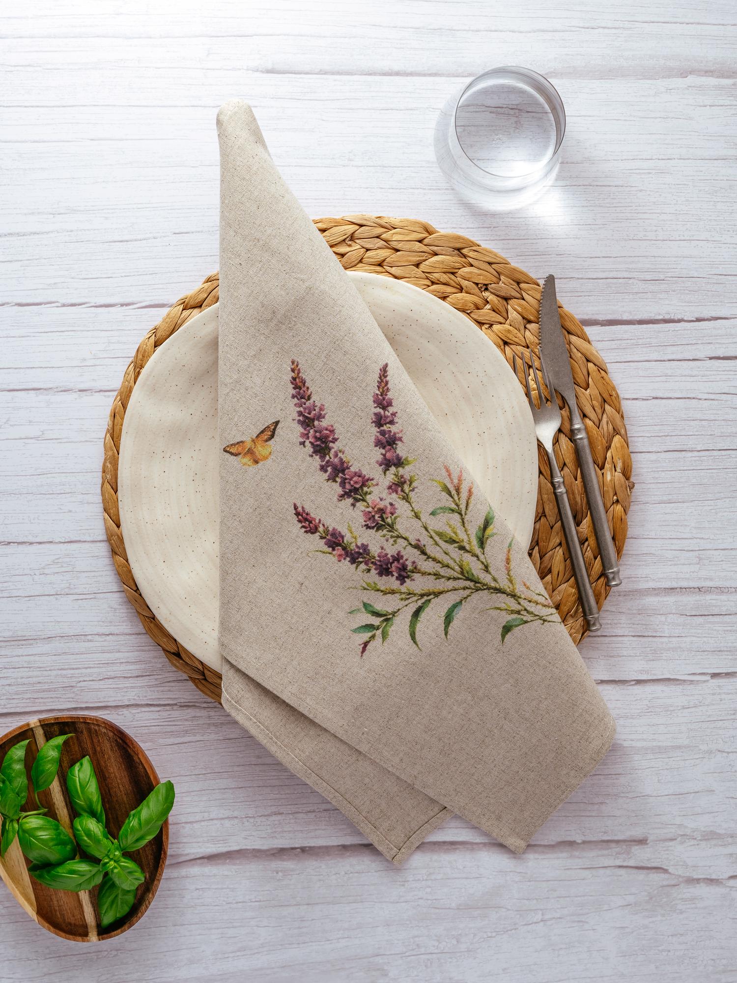 Embroidered linen napkin with botanical motif